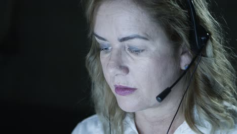Close-up-view-of-female-teleworker-in-headset